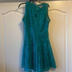 Turquoise lace dress with gold zipper down the back